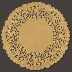 a gold doily on a black background