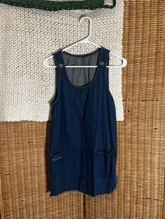 Mid-thigh jean overall dress with the word 'Angel' embroidered on one of front pockets. Denim Bib Dress, Denim Blue Overall Jeans With Button Closure, Denim Overalls With Button Closure, Blue Overall Dress, Courdory Overalls Dress, Jean Overall Dress, Neue Outfits, Overall Dress, Dress Clothes For Women