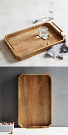 two wooden trays with different types of items on them, one is empty and the other has an empty glass in it