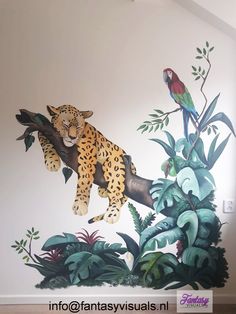 a mural of a leopard and a bird on a tree branch