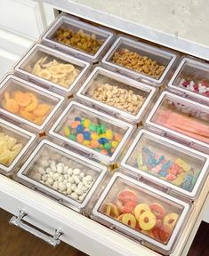 a drawer filled with lots of different types of snacks