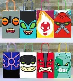 an assortment of paper bags with cartoon faces on them, all decorated in different colors