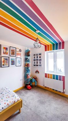 the room is decorated in rainbow colors