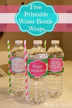 three water bottles with happy birthday labels on them