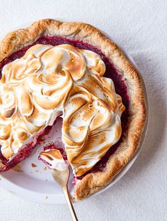 a pie on a plate with a slice missing