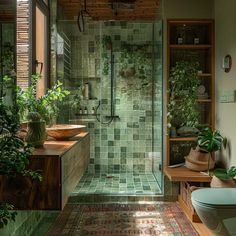 a bathroom with green tiles and plants in the shower