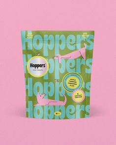 a bag of hopers cat treats on a pink and green background with the words hopers written across it