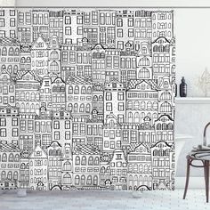 a black and white cityscape shower curtain in a bathroom with a bathtub