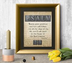 a cross stitch pattern with the words, and some yellow tulips next to it