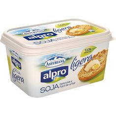 an image of alpro ice cream with banana on the top in a plastic container