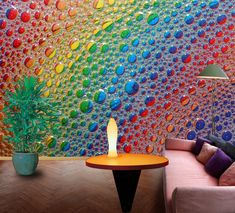 a living room with colorful bubbles on the wall