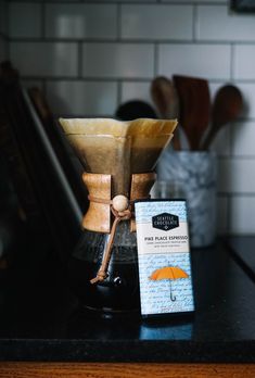 a coffee pot sitting on top of a counter