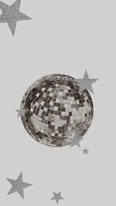 an image of a disco ball in the air with silver stars around it on a gray background