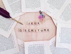 the word jeux decitiure spelled with scrabbles and flowers