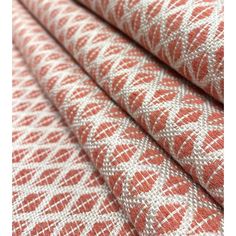 an orange and white patterned fabric