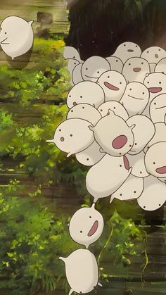 a bunch of white sheep floating in the air next to some trees and bushes with green leaves