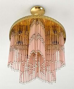 a pink chandelier hanging from the ceiling