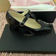 Beautiful Black Patent Leather Mary Jane. New Never Been Worn, With Original Packaging. Bought As A Gift But Were Too Big. Would Fit A 9.5-10. The Box Says 42 But Repetto Runs Small. For Reference, I Am A 8.5 And I Wear A 40. Elegant Leather Sole Mary Janes With Round Toe, Elegant Mary Janes With Heel Strap Medium Width, Elegant Low Heel Mary Janes For Formal Occasions, Elegant Formal Mary Janes, Classic Round Toe Mary Janes For Evening, High Heel Mary Janes For Formal Occasions, High Heel Fitted Mary Janes For Formal Occasions, Elegant Mary Janes With Leather Sole And Ankle Strap, Formal High Heel Fitted Mary Janes