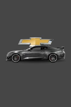 the chevrolet camaro is shown in this image, it's dark and shiny