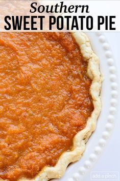 an uncooked pie sitting on top of a white plate