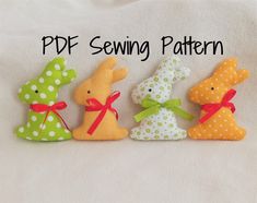 four stuffed animals are lined up in a row on a white sheet with the words sewing pattern below them