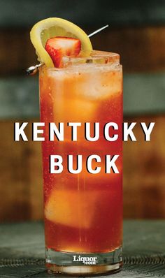 the kentucky buck cocktail is garnished with strawberries and lemon wedges on top