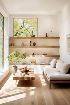 a living room filled with furniture next to a large window covered in windowsills