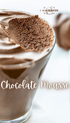 chocolate mousse in a glass with the words chocolate mousse above it