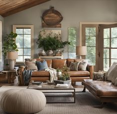 a living room filled with lots of furniture and decor on top of carpeted flooring