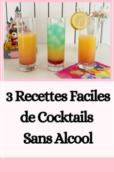 three glasses filled with drinks sitting on top of a table next to a pink towel