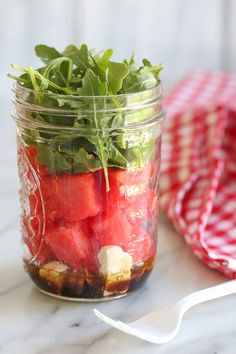 two jars filled with watermelon and herbs