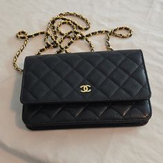 Authentic Black Chanel Caviar Quilted Wallet On Chain Woc. Excellent Condition. Make Me An Offer!! I Am The Second Owner Of This Bag. My Boss Bought It In Paris. She Wore It Once. I Have The Box And Dust Bag. I Will Include It. Size Base Length: 7.5 In Height: 4.75 In Width: 1.75 In Drop: 24.5 In . Classic Gold Wallet On Chain For Formal Events, Classic Gold Wallet On Chain For Formal Occasion, Classic Gold Wallet On Chain For Business, Luxury Travel Wallet With Chain Strap, Elegant Gold Wallet On Chain For Everyday Luxury, Luxury Gold Wallet On Chain For Business, Elegant Gold Wallet On Chain For Business, Luxury Everyday Wallet On Chain Clutch, Luxury Everyday Clutch Wallet On Chain