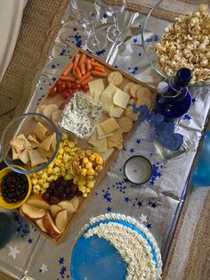 a table topped with plates and bowls filled with food