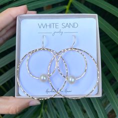 White Edison Pearl Hoop within a Hoop Earrings. PLEASE NOTE: The Edison pearls will vary in shape, size and color and will have natural occurring birthmarks. The pearls will range and measure from 9mm to 11mm. These are stock photos, the earrings you receive will be similar but different. NOTE: This listing is for ONE pair of earrings only. All White Sand Jewelry comes in a hand stamped gift box ready for gifting. PROCESSING TIME: Each piece is handcrafted and made-to-order, specifically for you Sand Jewelry, Marquise Earrings, Hippie Rings, Floating Necklace, Edison Pearls, Rainbow Rings, Mermaid Jewelry, Shell Ring, Pearl Hoop Earrings