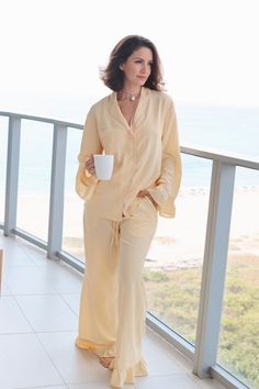 Indulge in ultimate comfort with our Mellow Yellow Daynaps Pajama. Made of bamboo fabric in stunning azo free dyes, this pajama can be worn day and night. With feminine ruffle details, elastic waist, and button closure, it offers a luxurious fit. Plus, it's machine washable for easy maintenance. The luxurious Mellow Yellow Daynaps Pajama will be shipped in January 2025. As a special touch, each order includes a beautifully illustrated card and a unique QR code that grants access to a collection Pajama Set White, Yellow Pajamas, Bamboo Pajamas, Silk Pajamas, Card Illustration, Bamboo Fabric, Mellow Yellow, Dress Pant, Day And Night