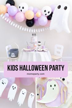 kids'halloween party with balloons and ghost decorations on the wall, table cloths and plates