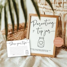 a sign that says, parenting tip jar is shown next to a basket with a plant