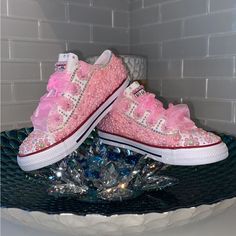 Custom Toddler Converse Designed In Baby Pink Ab Pearls With A Touch Of Ivory Ab Pearls, And Ab Rhinestones!! Toddler Sizing Up To 11 Can Be Customized With Color Of Your Liking! Please Allow 3 Business Days To Create Your Masterpiece!! Hot Pink Cute Baby Converse, Bling Baby Shoes Pink, Custom Baby Shoes Glitter, Bling Converse Toddler, Black And White Bling Converse Toddler, Pink Embellished Sneakers With Round Toe, Pink Low-top Bling Sneakers, Pink Bling Low-top Sneakers, Pink Glitter Accents Sneakers With Round Toe