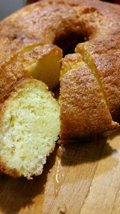 a bundt cake is cut in half on a cutting board