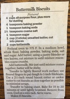 a recipe for buttermilk biscuits on a wooden table