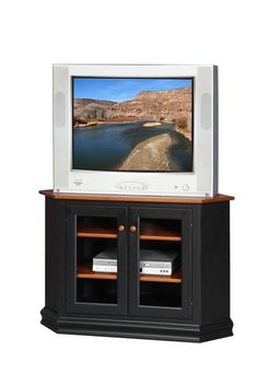 an entertainment center with a television on it's stand and two doors that open