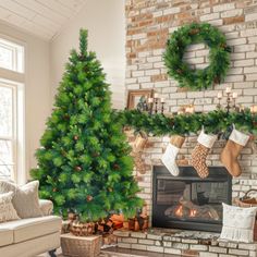 a living room with a christmas tree and fireplace