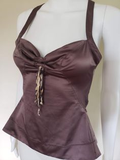 Fitted Coquette Camisole Tank Top, Chic Sleeveless Top With Fitted Bodice, Chic Fitted Bodice Sleeveless Tops, Coquette Fitted Tank Top With Spaghetti Straps, Vintage Sleeveless Top With Built-in Bra, Flirty Fitted Cami Top, Brown Fitted Cami Tank Top, Flirty Fitted Camisole, Flirty Sleeveless Satin Tops