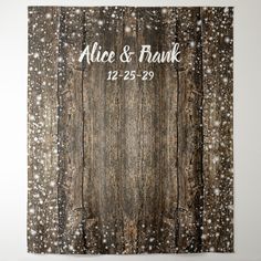 a wooden background with snow flakes and the words, alice & frank on it