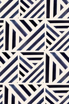 an abstract black and white pattern with diagonal stripes