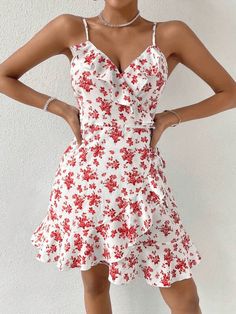 This beautiful WYWH Floral Print Ruffle Trim Wrap Knot Side Cami Dress is the perfect addition to your summer wardrobe. Its lightweight and flowy fit is crafted from 95% Polyester and 5% Elastane fabric, with fresh all-over floral print accents and ruffle and wrap detail that add a touch of boho-chic to your look. The sleeveless spaghetti strap dress features a high waist and regular fit, perfect for twirling in the sunshine. Style: Boho Pattern Type: Floral, All Over Print Details: Ruffle, Wrap Summer Floral V-neck Dress With Ruffles, Flirty V-neck Floral Dress For The Beach, Flirty V-neck Ruffle Dress For Summer, Chiffon Dress With Ruffled Straps For Brunch, White V-neck Ruffle Dress For Day Out, Sleeveless Ruffled Sundress For Summer Outings, Summer V-neck Ruffle Dress For Garden Party, Casual White Mini Dress For Summer Outings, White Sleeveless Mini Dress For Summer Outings