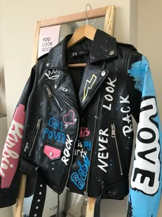 Lettering Pink Style Leather Biker Jacket | Meow | Barbie These jackets are in a different style from the standard jackets. They're perfect for your street style favorite, birthday party, festival or alternative style wedding (or bachelorette party) or any occasion! All of my hand painted jackets are custom dyed to your specifications, each individually painted to order, all sizes are available and we can create any different patterned jacket you want. CARE Each jacket is painted with a light ra Custom Biker Jacket, Biker Jacket Design, Customised Leather Jacket, Painted Biker Jacket, Decorated Leather Jacket, Graffiti Leather Jacket, Painting On Leather Jackets, Printed Jackets For Women, Spray Paint Jacket