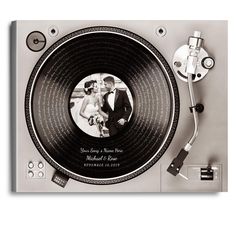 a record player with a wedding photo on it