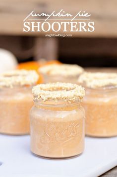 three mason jars filled with homemade pumpkin pie shooters