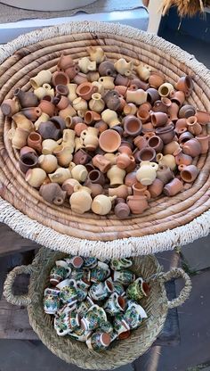 a basket filled with lots of different types of pottery